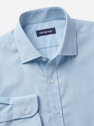 Camisa azul claro lisa de planchado fácil de punta a punta